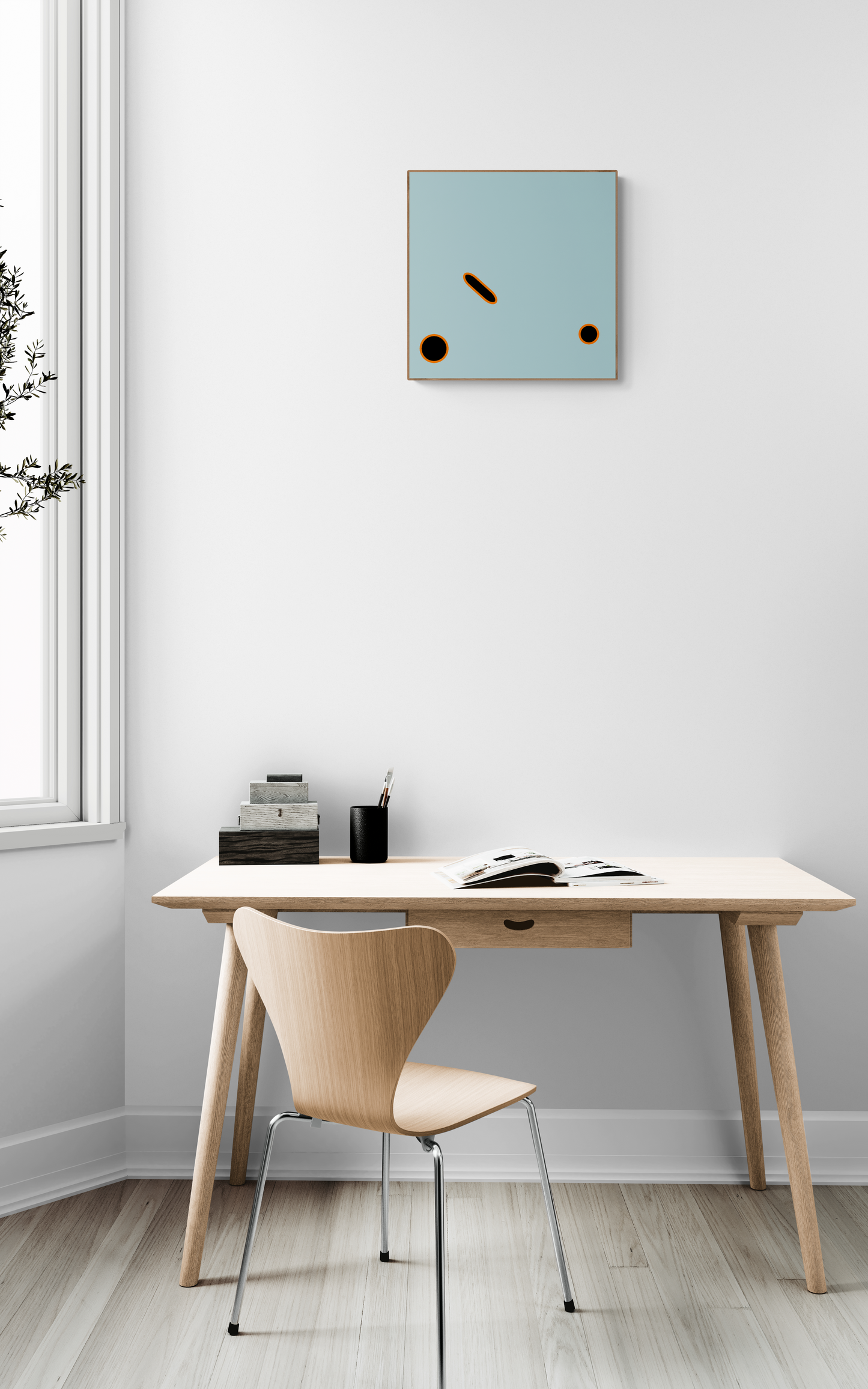 Minimalist home office with a wooden desk and chair, light blue wall art print, and a window.