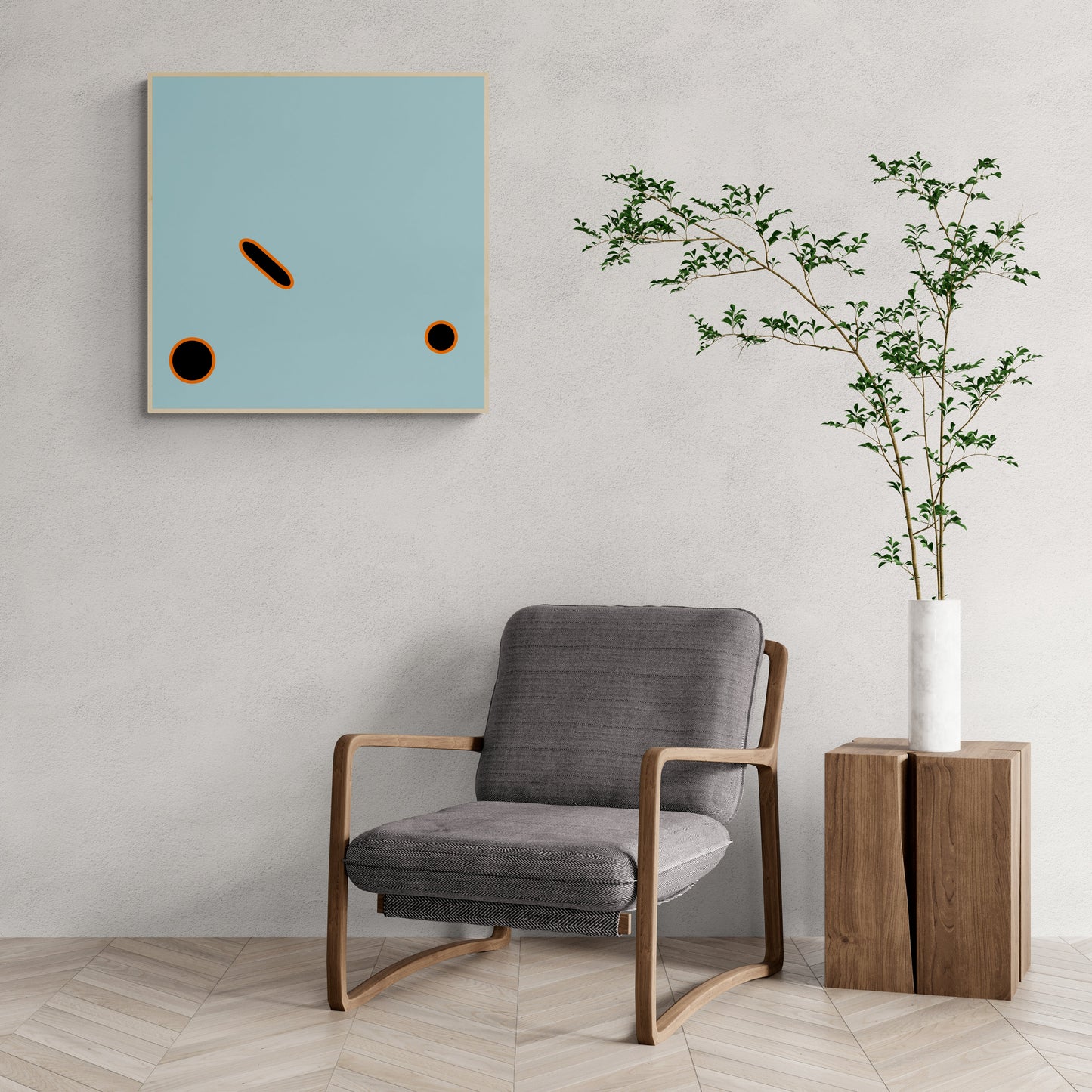 Modern interior with a gray armchair, blue abstract art print, and plant.