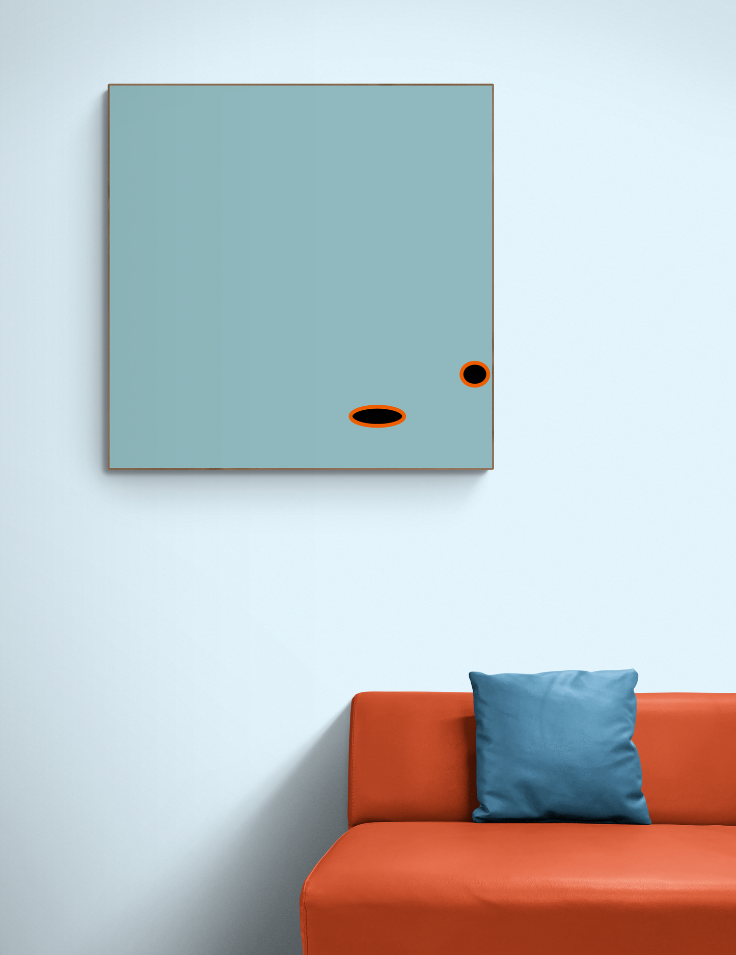 Modern interior with a light blue wall, orange sofa, and a square light blue artwork print