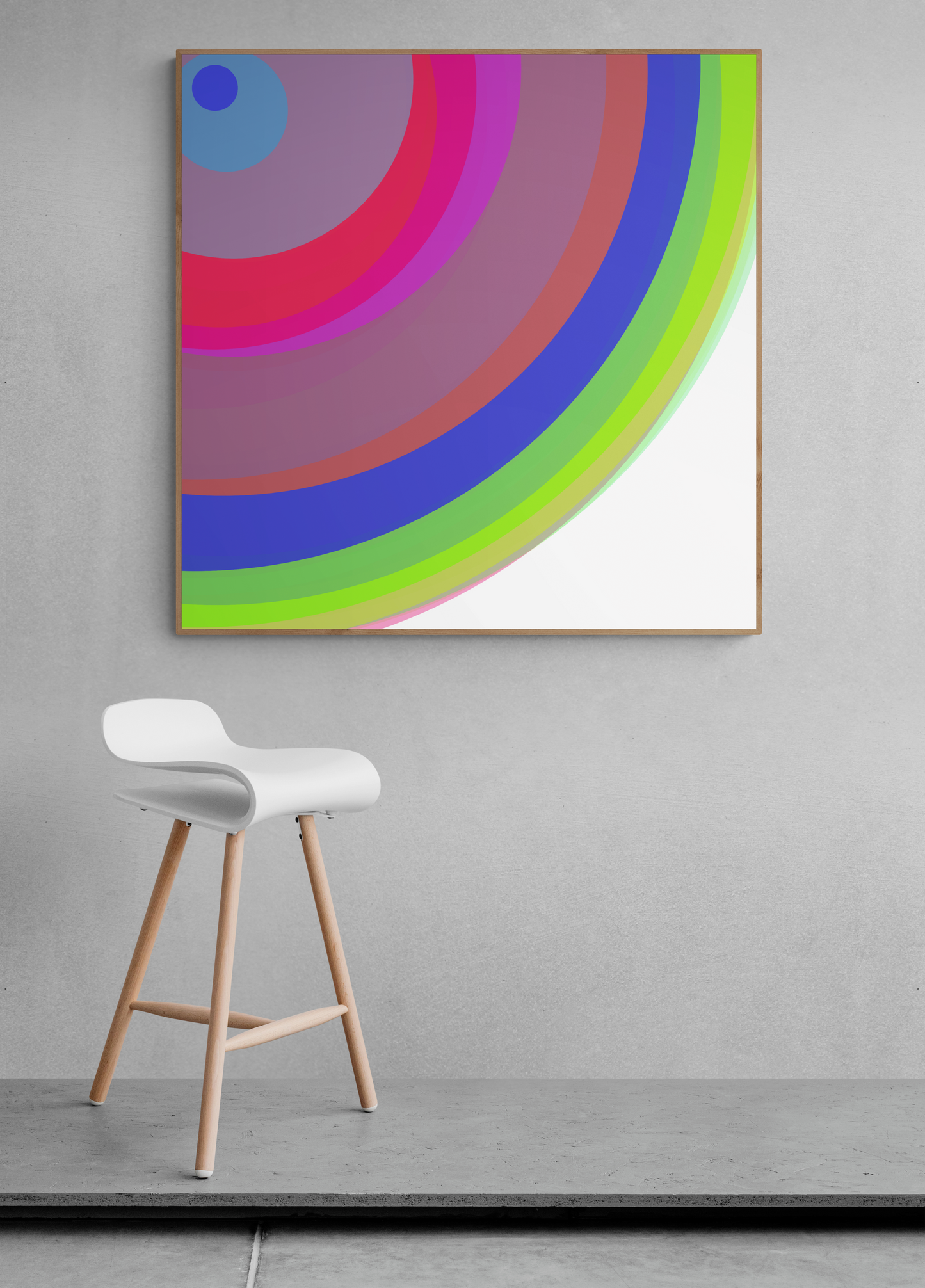 Colorful abstract art print on a gray wall with a white stool below.
