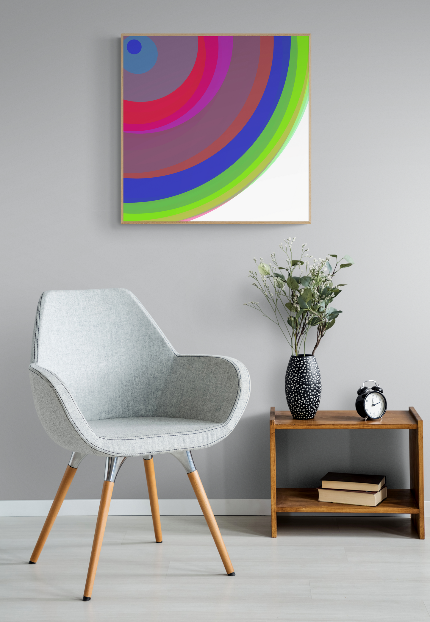 Modern interior with a colorful abstract art print, gray chair, wooden side table, and decorative items.