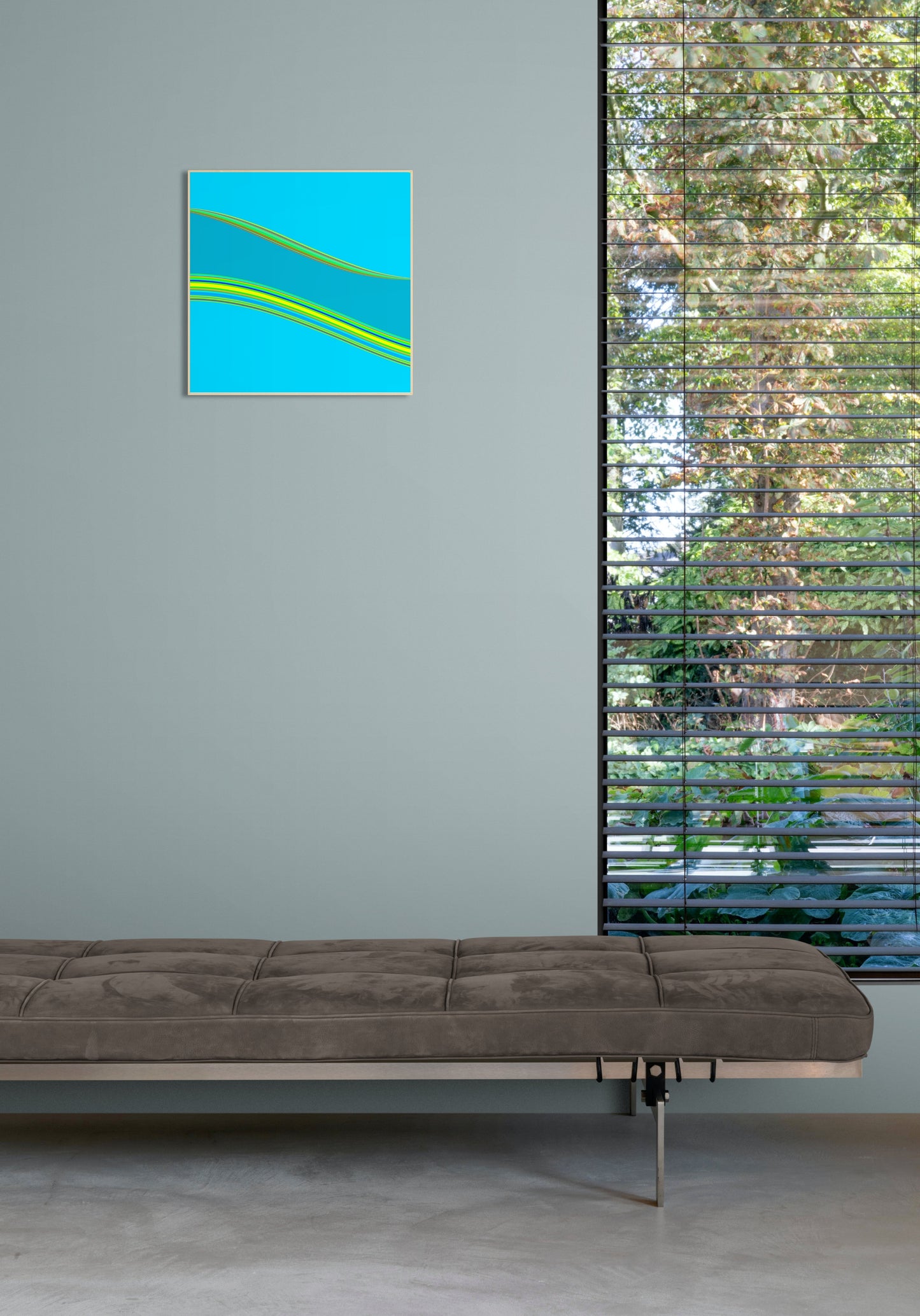 Modern interior with a gray sofa and abstract generative art print on a gray wall.