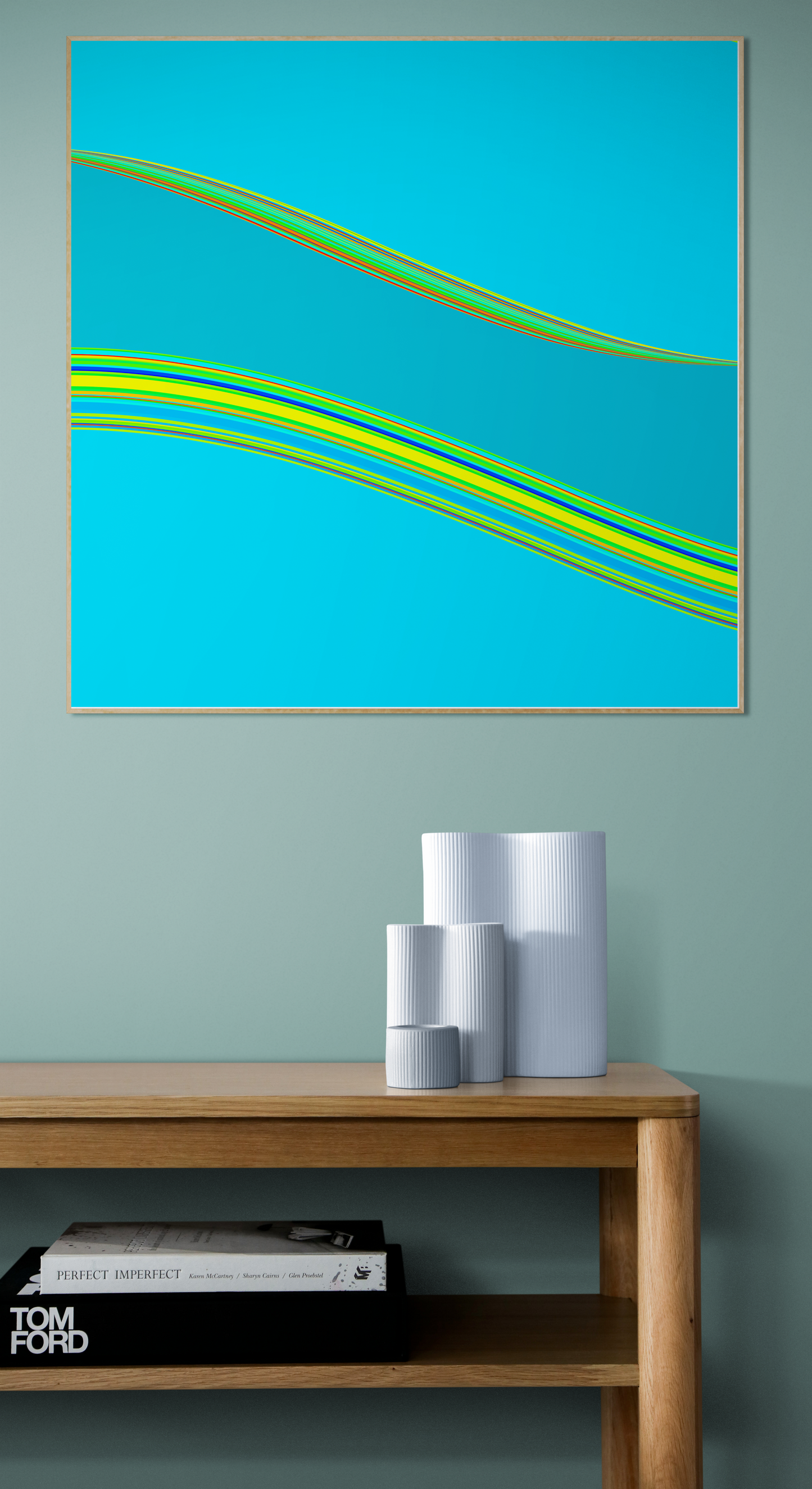 Abstract generative art print with wavy green lines on a blue background, displayed above a wooden shelf.