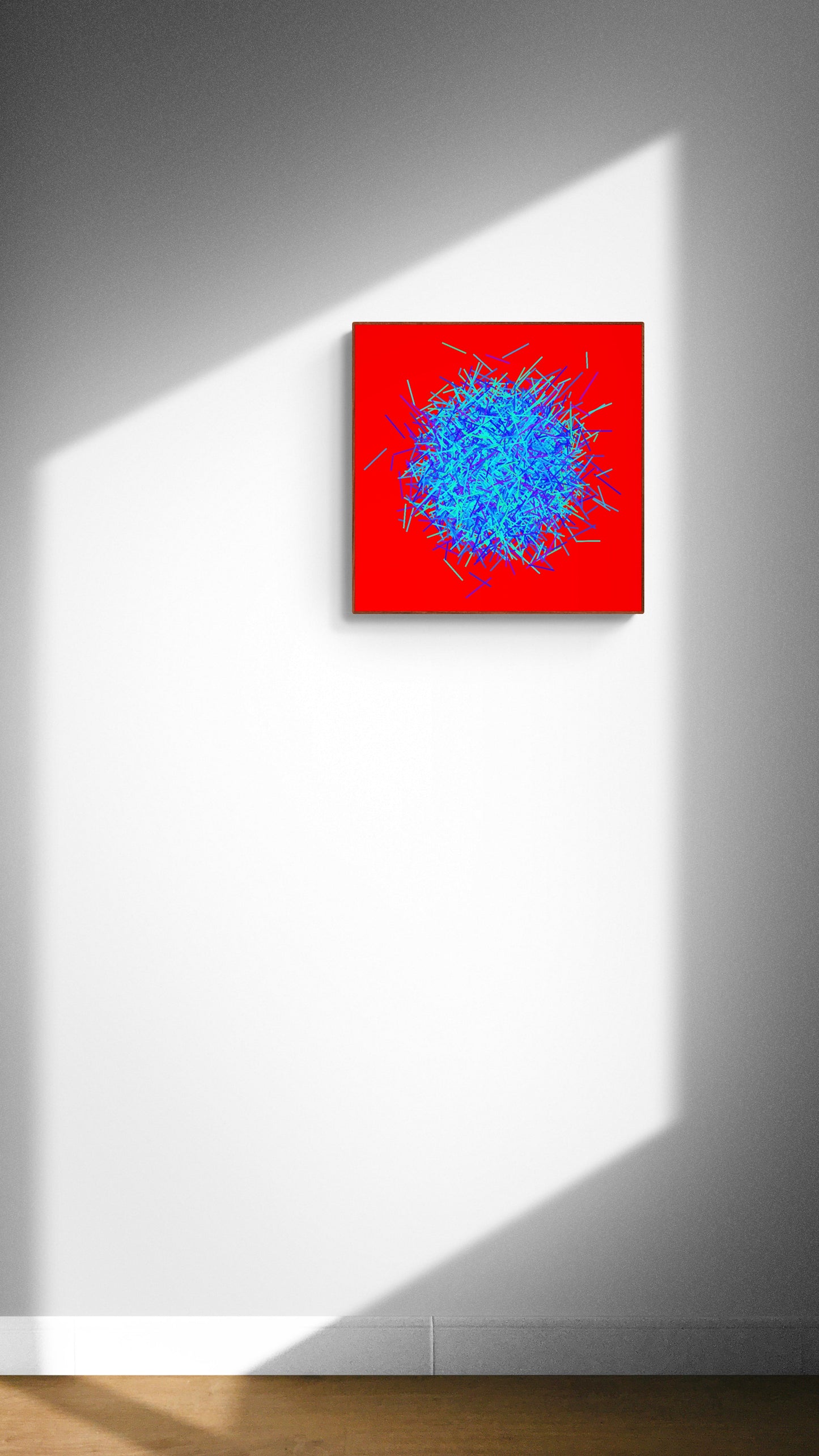 Abstract patterned art print of ball of blue and green lines on a red background on a white wall