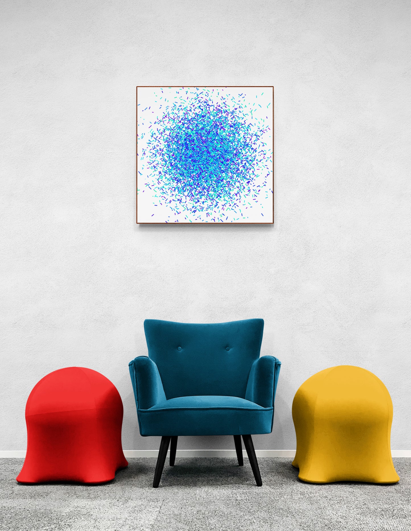 Three colorful chairs (red, blue, yellow) in front of a colorful green blue confetti patterned abstract art print on a white background on a white wall.