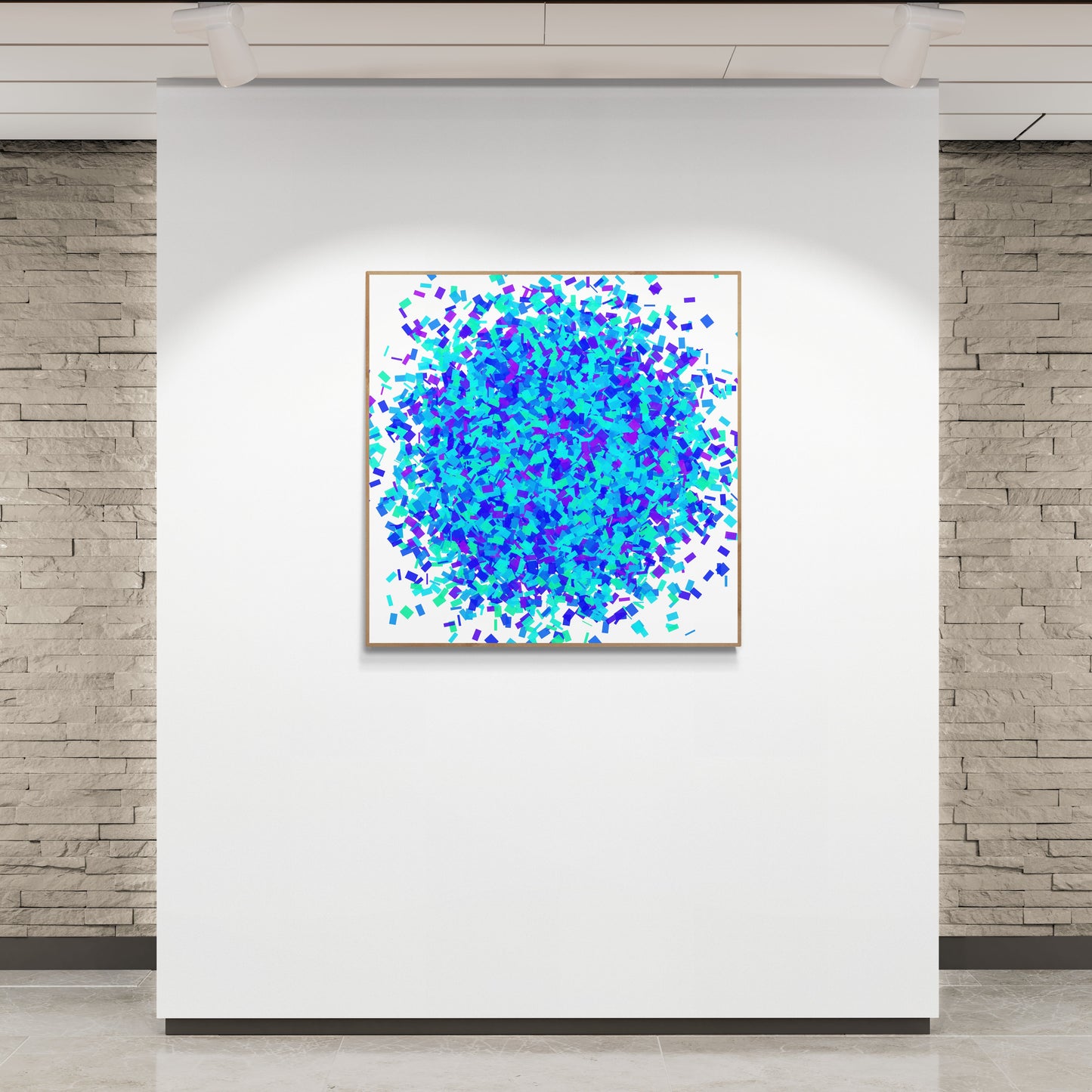 Colorful green blue confetti like patterned abstract art print on a white background on a white wall.