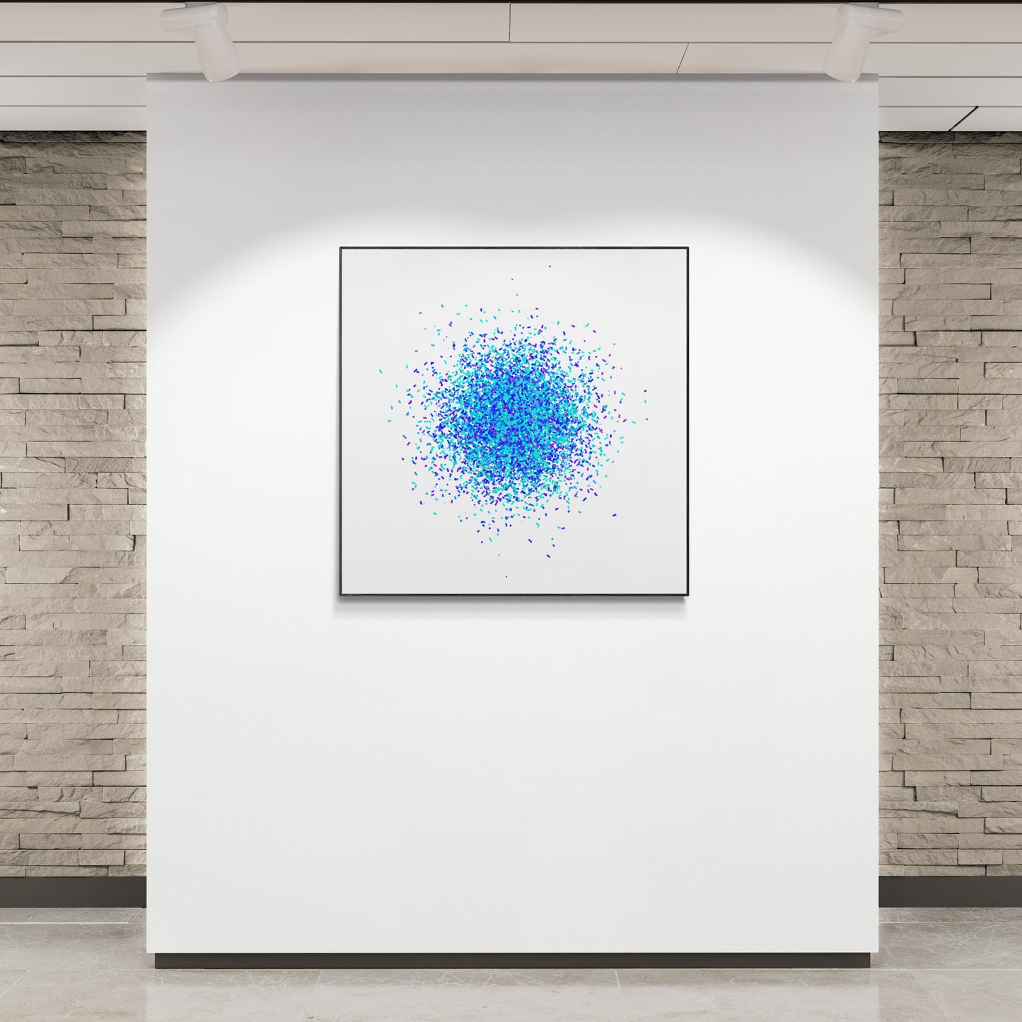 Framed abstract artwork print with blue and white pattern on a white wall.