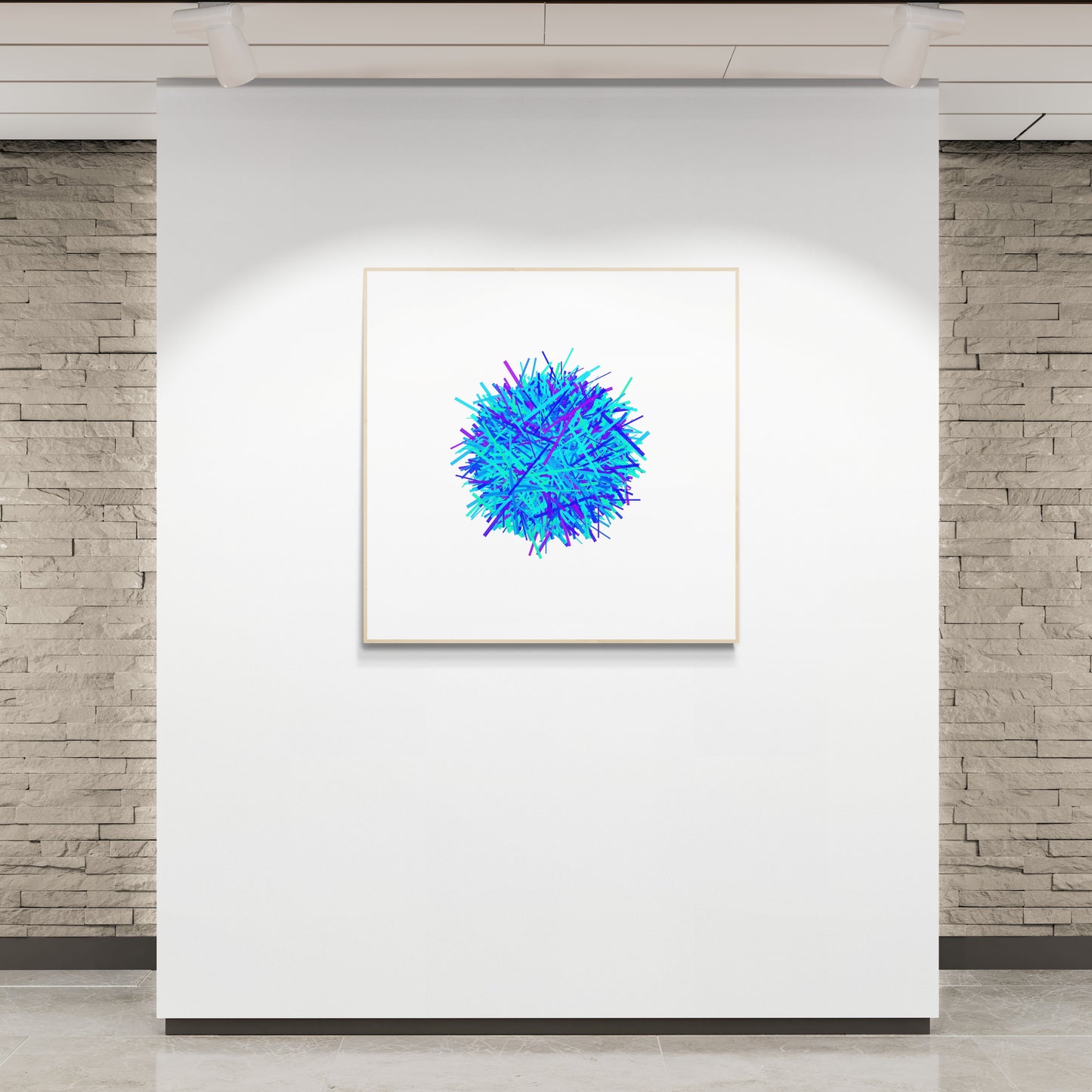 Colorful abstract art print of a sphere made of blue, green intersecting lines on a white background on a white wall with stone walls in the background