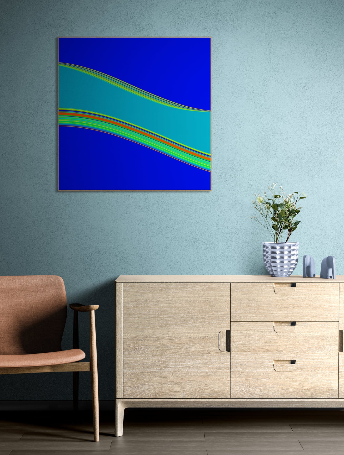 generative art print on a wall above a wooden cabinet with a chair and decorative items.