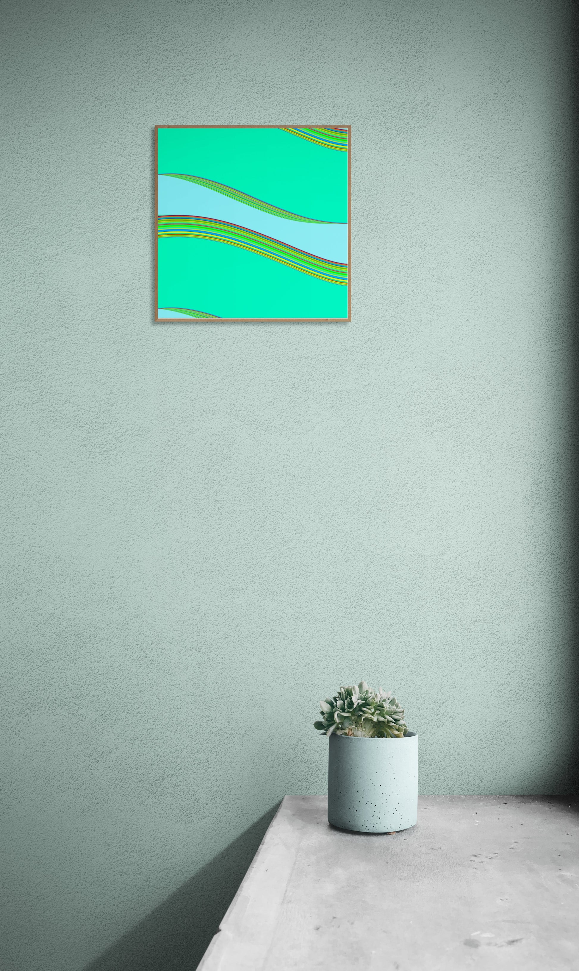 Framed abstract generative art print on a light green wall with a small potted plant below.