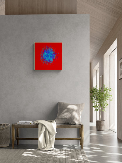 Abstract patterned art print of blue and green lines on a red background on a gray wall above a bench in a modern room.