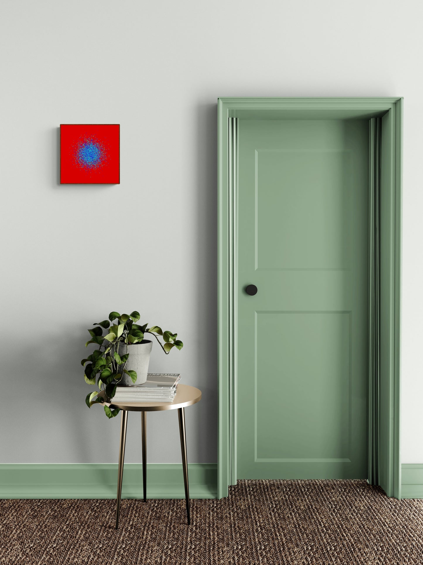 Room interior with a green door, small table with plant, and blue, green, purple confetti like patterned abstract print on a red background on gray wall.
