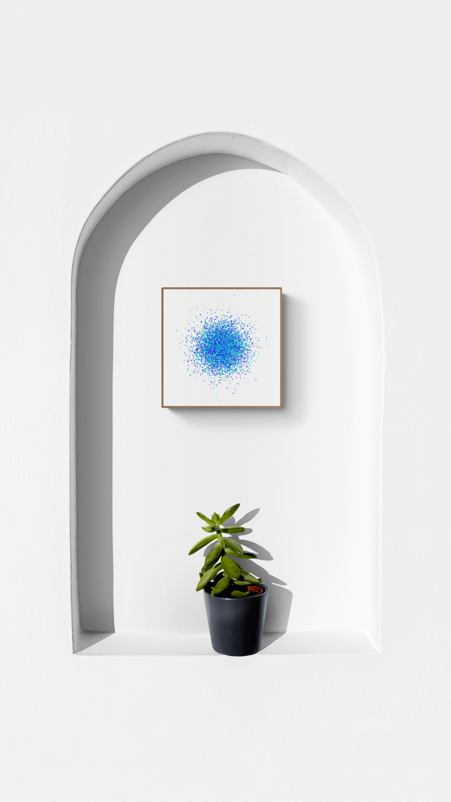 Modern interior design with a white arch, blue and green speckle patterned abstract art print on a white background, and potted plant.